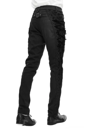 Gothic slim-fit black trousers with metal buckle back belt and lace side detailing, rear view on model