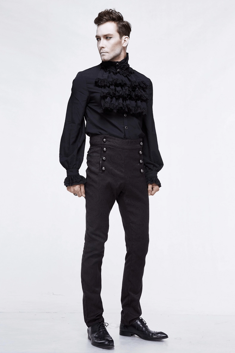 Vintage-inspired black gothic slim pants detail shot highlighting paisley jacquard weave and decorative button elements