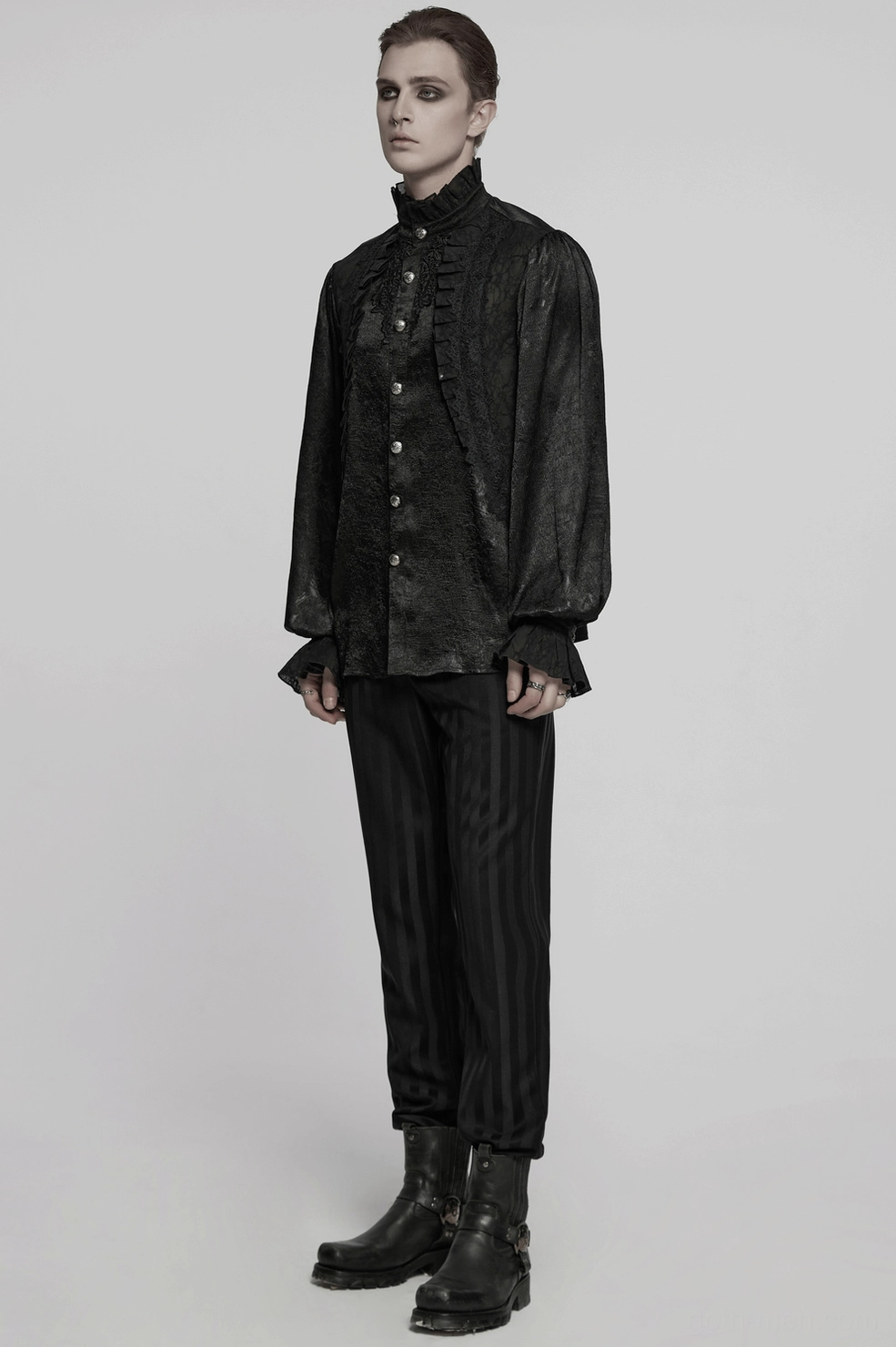 Front view of black Victorian gothic shirt showcasing ruffled collar and lace panel construction