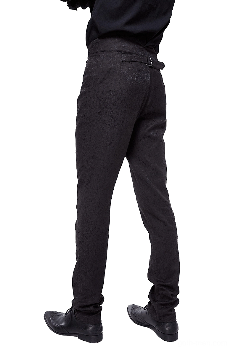 Back view of vintage-inspired black gothic slim-fit pants on male model, displaying rear belt adjuster and tapered leg design