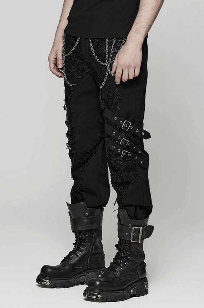 Black gothic slim-fit trousers showing knee segmentation design and lace inserts