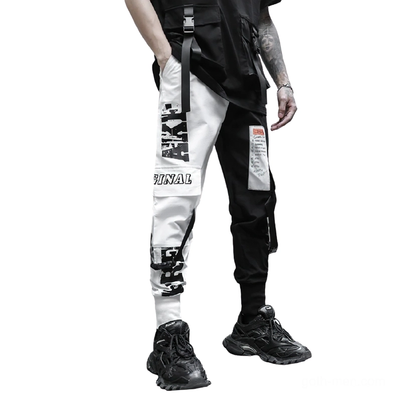 Men's gothic patchwork cargo pants front medium shot with letter graphic prints and tactical straps