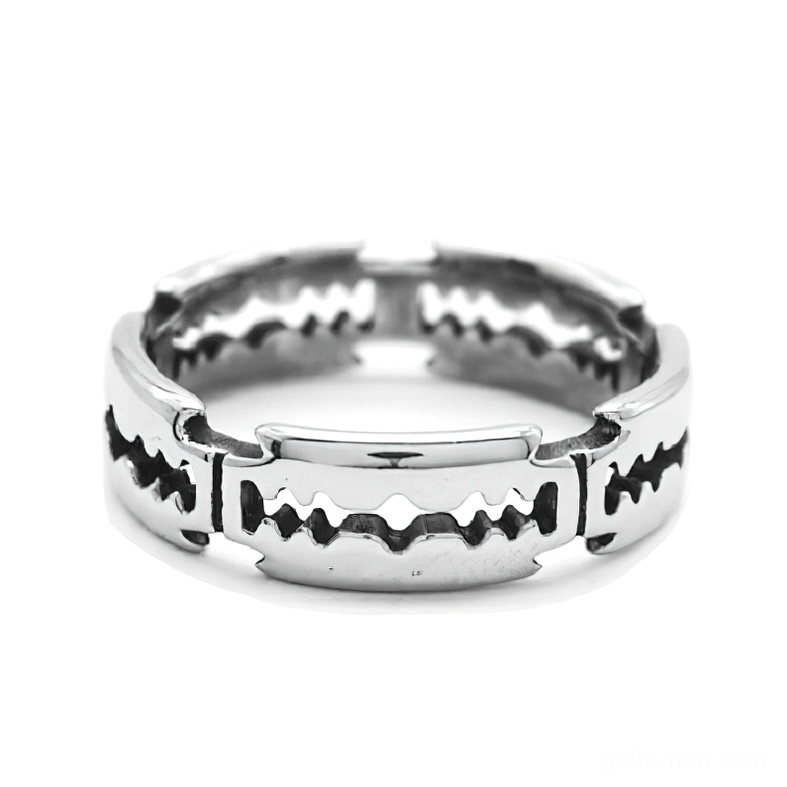 Stainless steel punk blade ring - top-down front view displaying segmented sawtooth pattern and industrial design