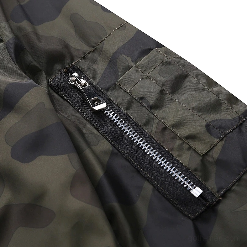 Sleeve zip pocket detail with metal zipper and camouflage fabric on gothic military jacket