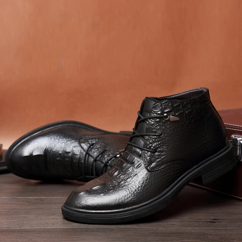 Black gothic ankle boot back view showcasing heel height and vertical lace-up design pattern