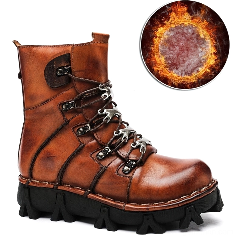 Extreme closeup of brown leather gothic boot lacing area showcasing metal decorative hooks and reinforced stitched leather panels construction