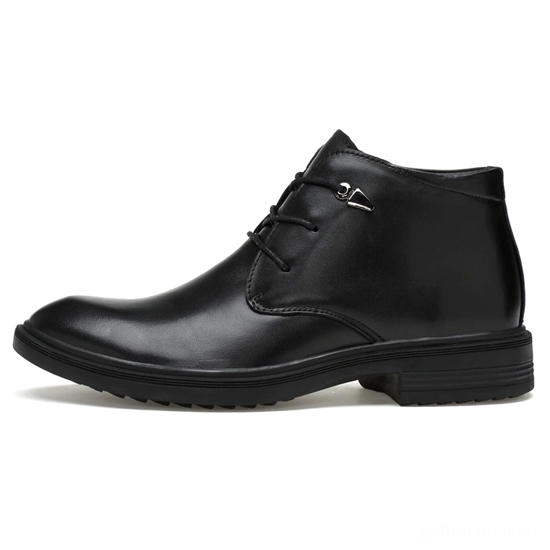 Men's black gothic boot crocodile grain leather texture close-up showing embossed pattern detail