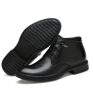 Black gothic boot sole and side profile showing rubber outsole with tread pattern and low block heel