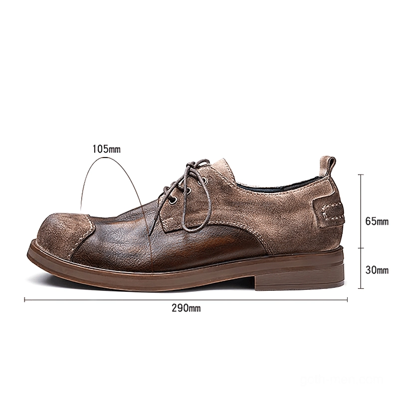Single men's distressed leather gothic boot in profile, displaying round toe shape, rubber outsole, and two-tone brown finish with dimensions