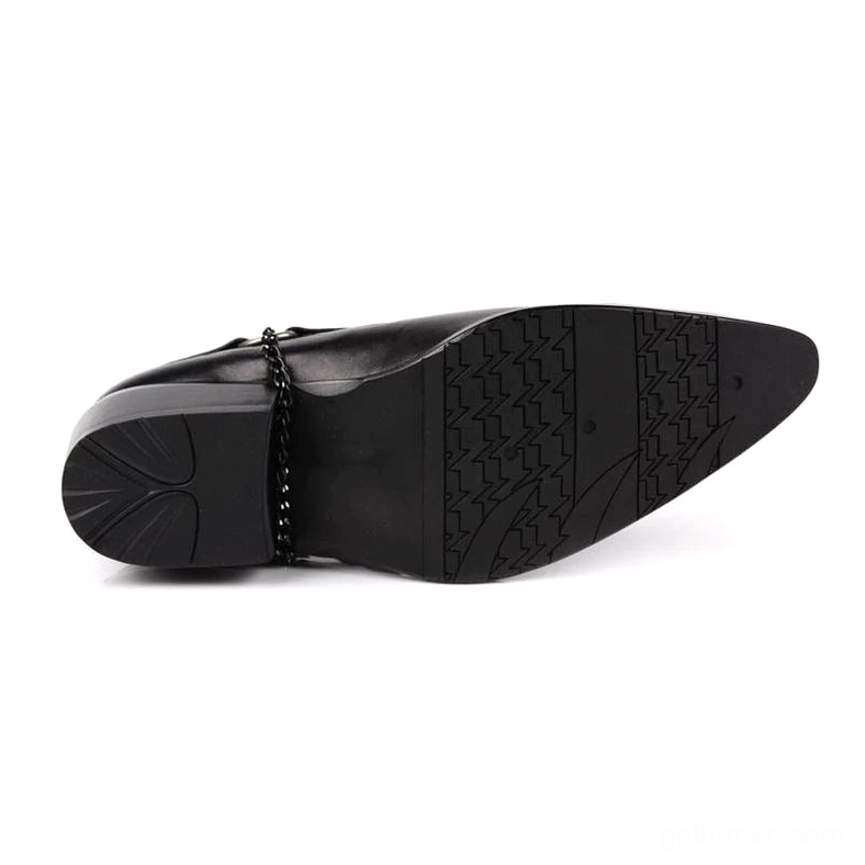 Black leather gothic boots outsole detail showing chain accent and rubber construction