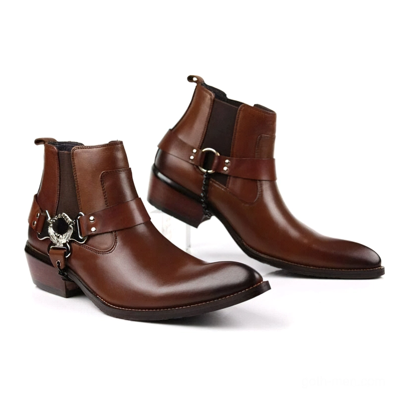 Brown leather gothic boots with western-style harness buckle strap and chunky heel