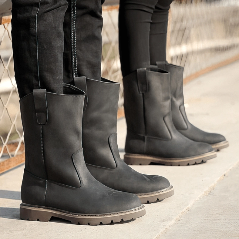 Close-up detail of brown gothic leather boots buckle hardware and craftsmanship