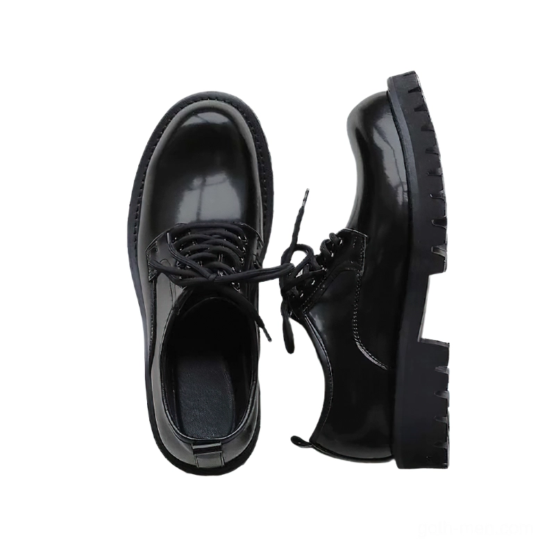 Interior view of gothic platform boots displaying shoe lining and chunky rubber sole construction