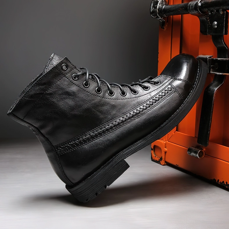 Black gothic ankle boots men's lace-up design round toe shape closeup detail