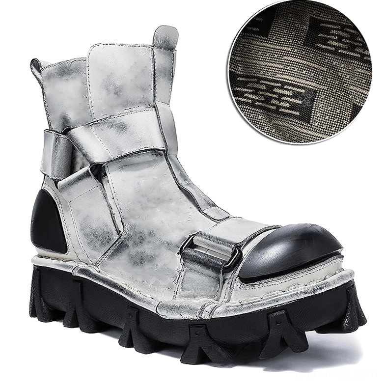 Round toe gothic punk boots with perforated vamp design and buckle strap hardware arrangement