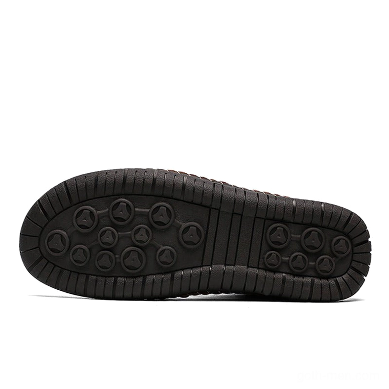 Bottom view of gothic boot non-slip rubber sole with dotted anti-slip pattern for winter traction