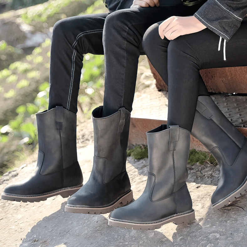 Brown gothic mid-calf boots sole detail showing rugged lug tread pattern grip