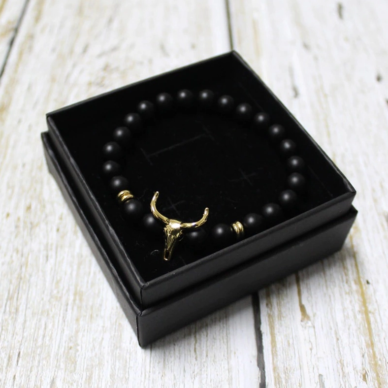 Gothic bull skull stone bead bracelet for men presented in premium black gift box, luxury packaging