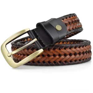 Two hand-knitted gothic braided leather belts in black and tan brown tones with gold metal buckles, overhead view