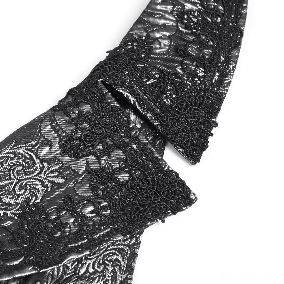 Black silver gothic waistcoat floral damask brocade fabric close-up with black lace overlay pattern
