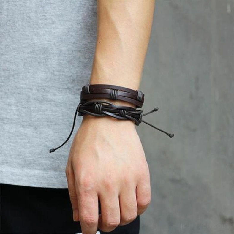 brown leather gothic bracelets woven and flat strap designs on male wrist