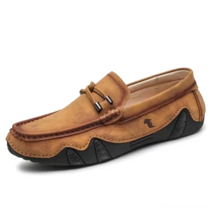 Alternative dark brown leather loafers for men with vintage aesthetic and metal embellishment