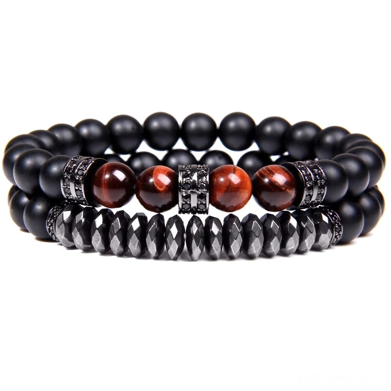 Dark gothic bracelet featuring black matte onyx beads, brown tiger eye stones, and silver rhinestone accents