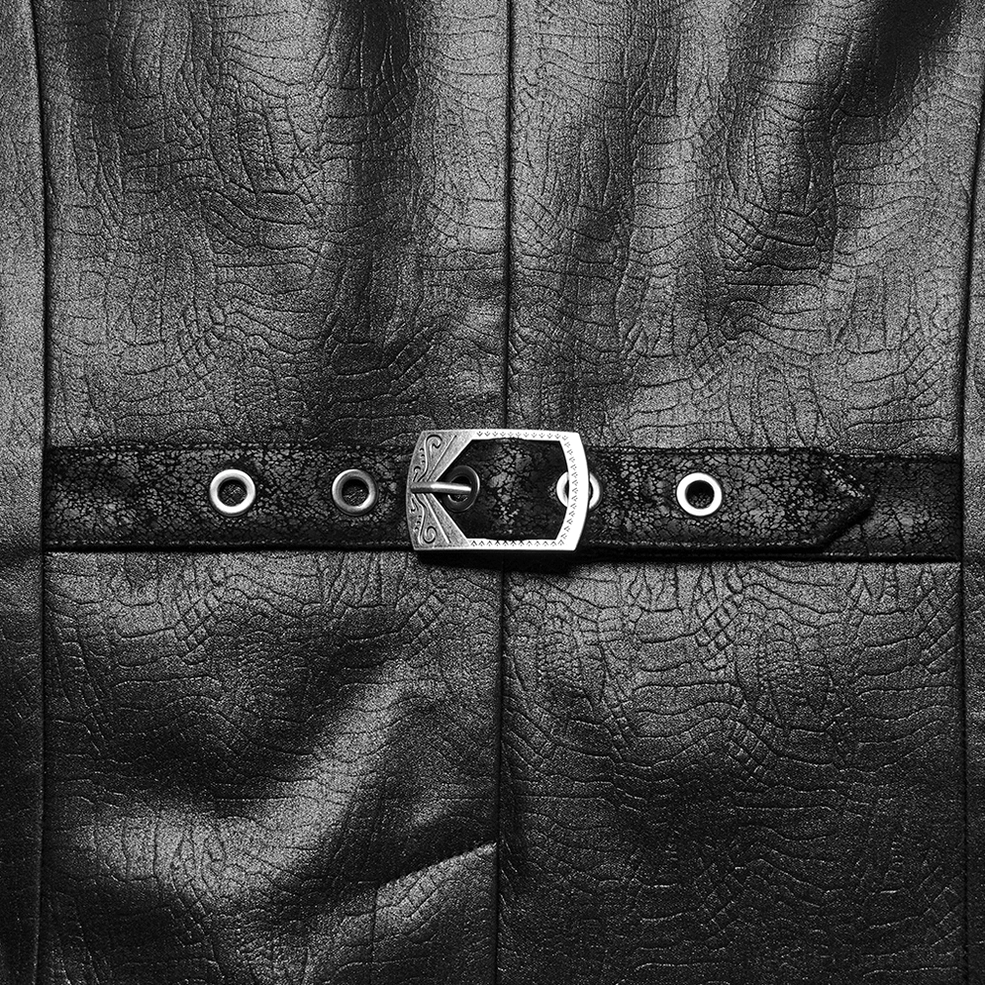 Macro close-up of rectangular metal snake buckle on cracked faux leather with grommets