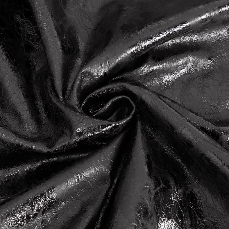 Men's gothic faux leather coat highlighting multiple buckle closures, embossed texture details, and architectural design elements