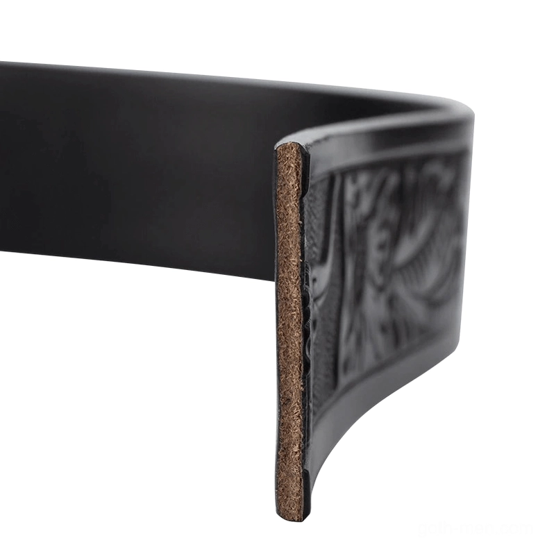 Vintage embossed leather belt with ornate bull head buckle texture detail