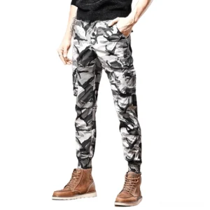 Light gray camouflage slim-fit cargo pants with multi-utility pockets on male model in front studio view