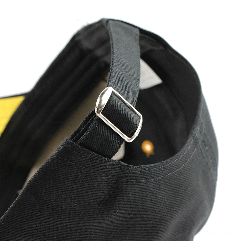 Close-up of adjustable metal buckle strap mechanism on gothic baseball cap