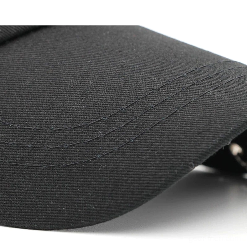Gothic baseball cap brim edge detail showing twill fabric and stitched construction