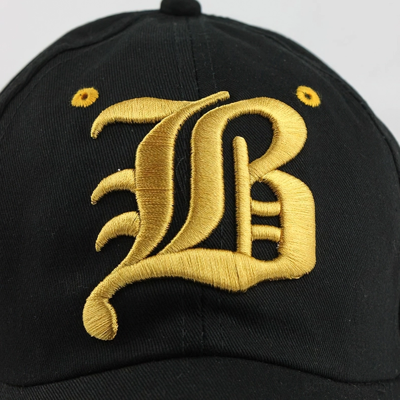 Macro detail shot of gold letter embroidery and ventilation eyelets on gothic baseball cap
