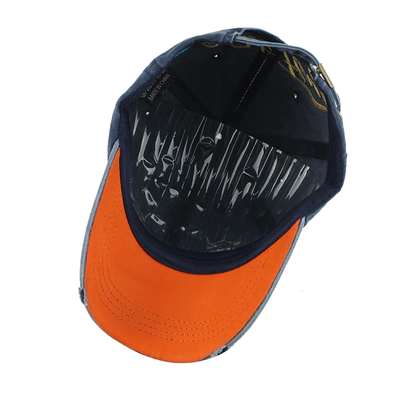 Gothic cap interior detail showing orange lining, plastic sweatband, and adjustable closure system