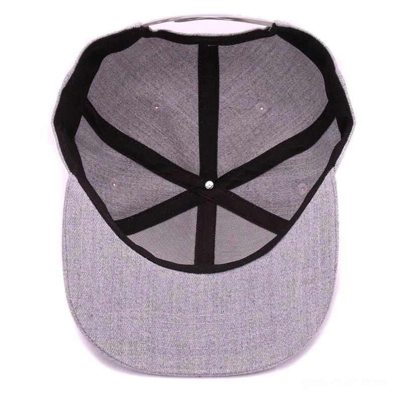 Interior bottom view of gothic baseball cap showing crossed crown lining fabric and adjustable snapback closure hardware