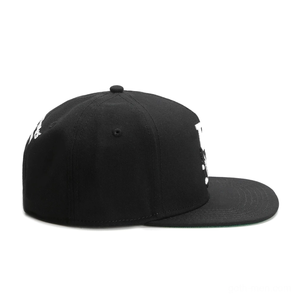 Right side profile of black flat-brim gothic baseball cap with embroidered white design