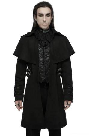 Black suede gothic cape coat with decorative buckles front view, showcasing cape collar, hand-carved cuff straps, and embroidered inner vest detail on male model