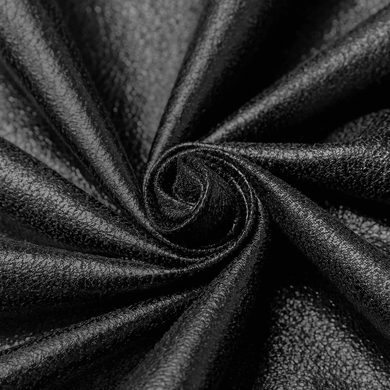 Gothic black cape construction detail showing velvet panel and braided embroidery craftsmanship
