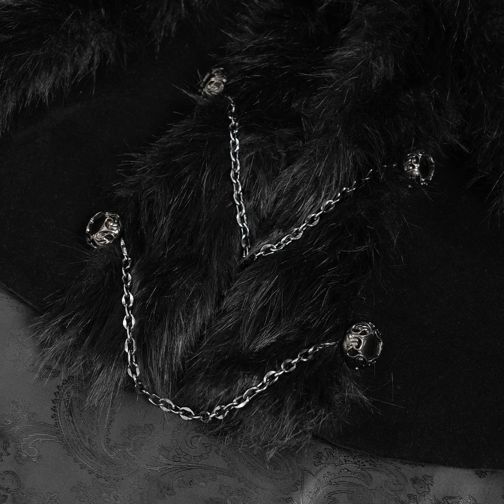 Black gothic cape on mannequin showcasing theatrical drape and faux fur trim from mid-length angle