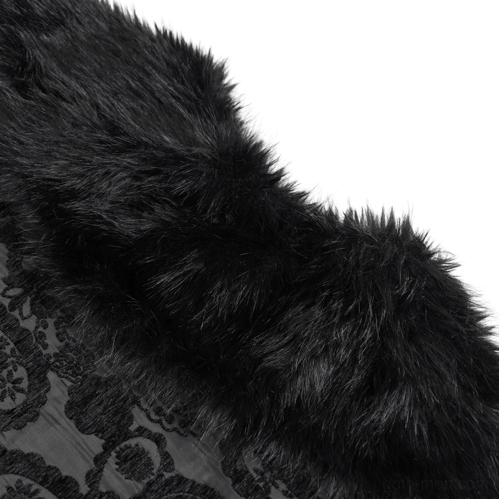 Close-up macro detail of black gothic cape faux fur hem and underlying paisley jacquard fabric weave