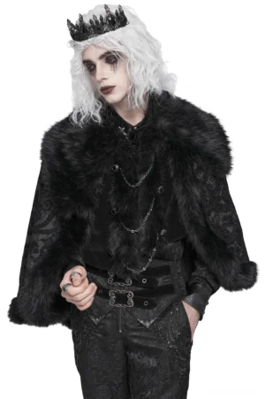 Black gothic cape with faux fur collar worn by male model with crown, front three-quarter view showing paisley brocade and decorative chains
