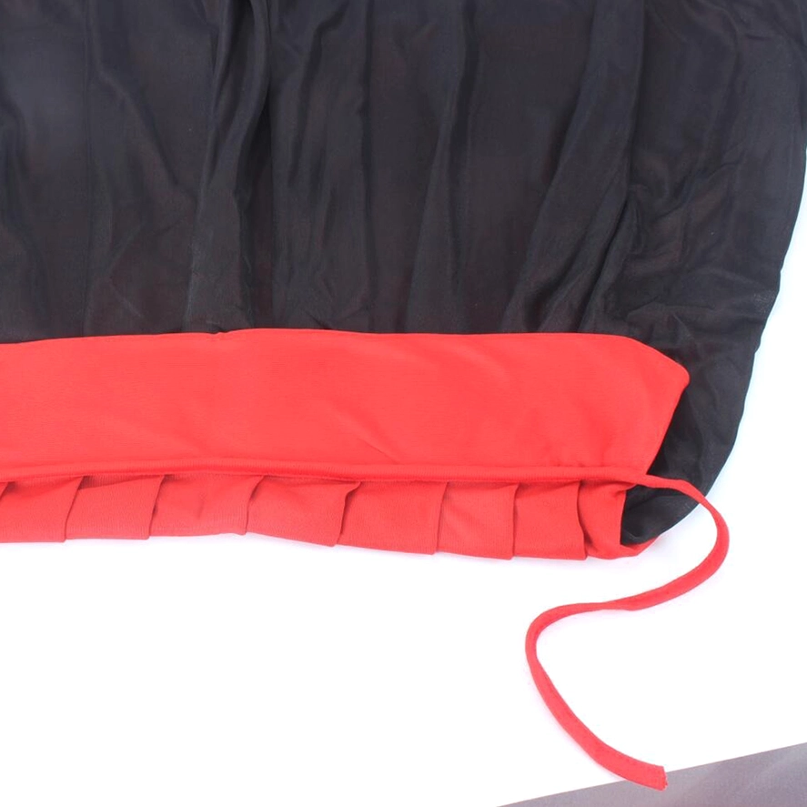 Gothic cape hemline close-up showing double-layer fabric construction with red drawstring detail