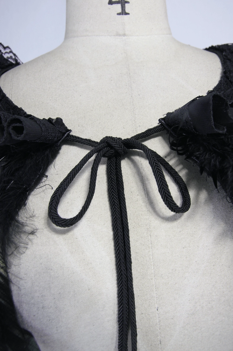 Gothic capelet back detail close-up braided drawstring lace ruffle trim iridescent feathers