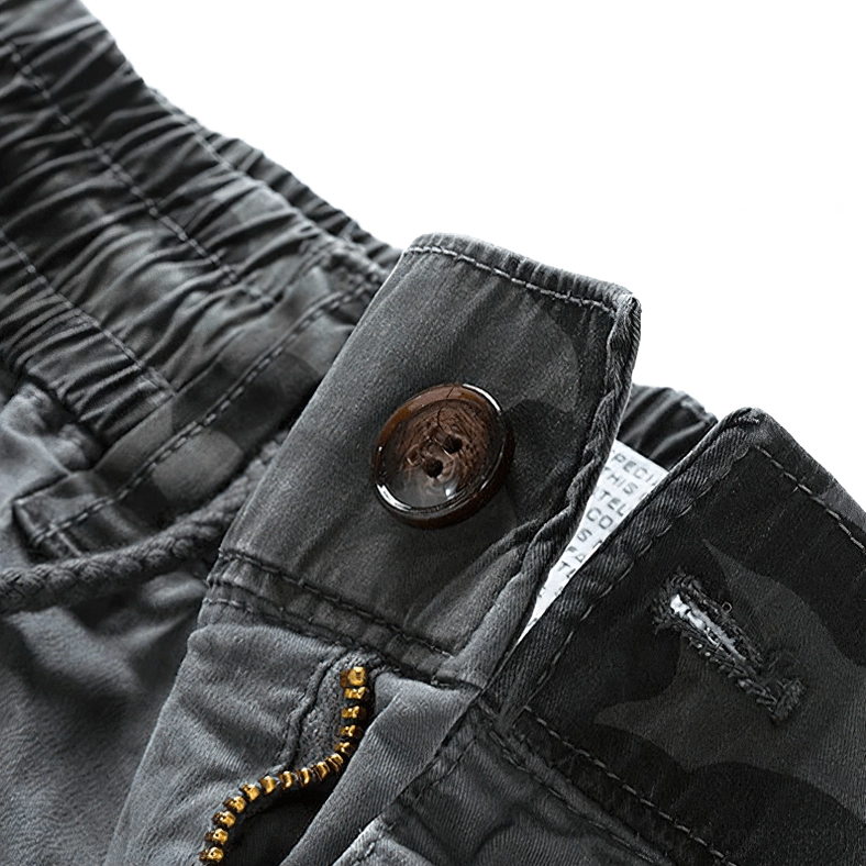 Button closure metal zipper and branded fabric label waist detail gothic joggers