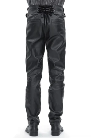 Black gothic cargo pants back view showing lace-up panel detail on back waist and slim tailored fit from behind