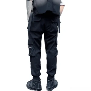 Black cargo pants rear view showing large tactical pockets and webbing straps with elastic cuffs