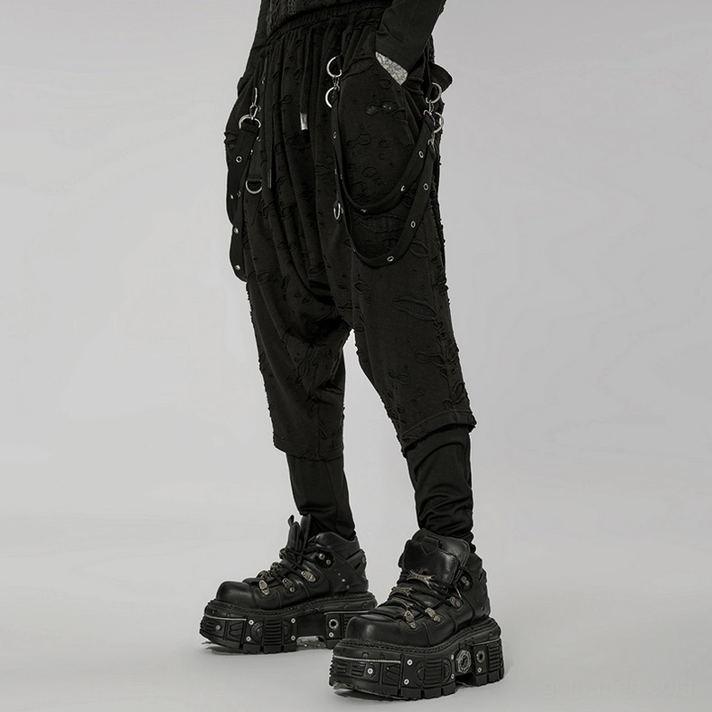 Black gothic pants fabric and strap construction detail with metal hardware and elastic waistband