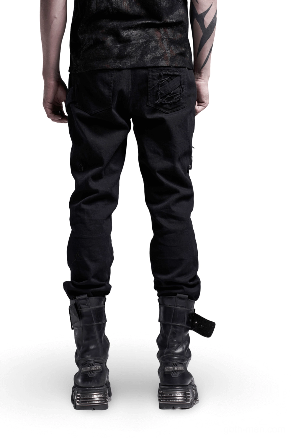 Black gothic cargo pants rear view worn by male model, displaying embroidered back pocket and structured silhouette