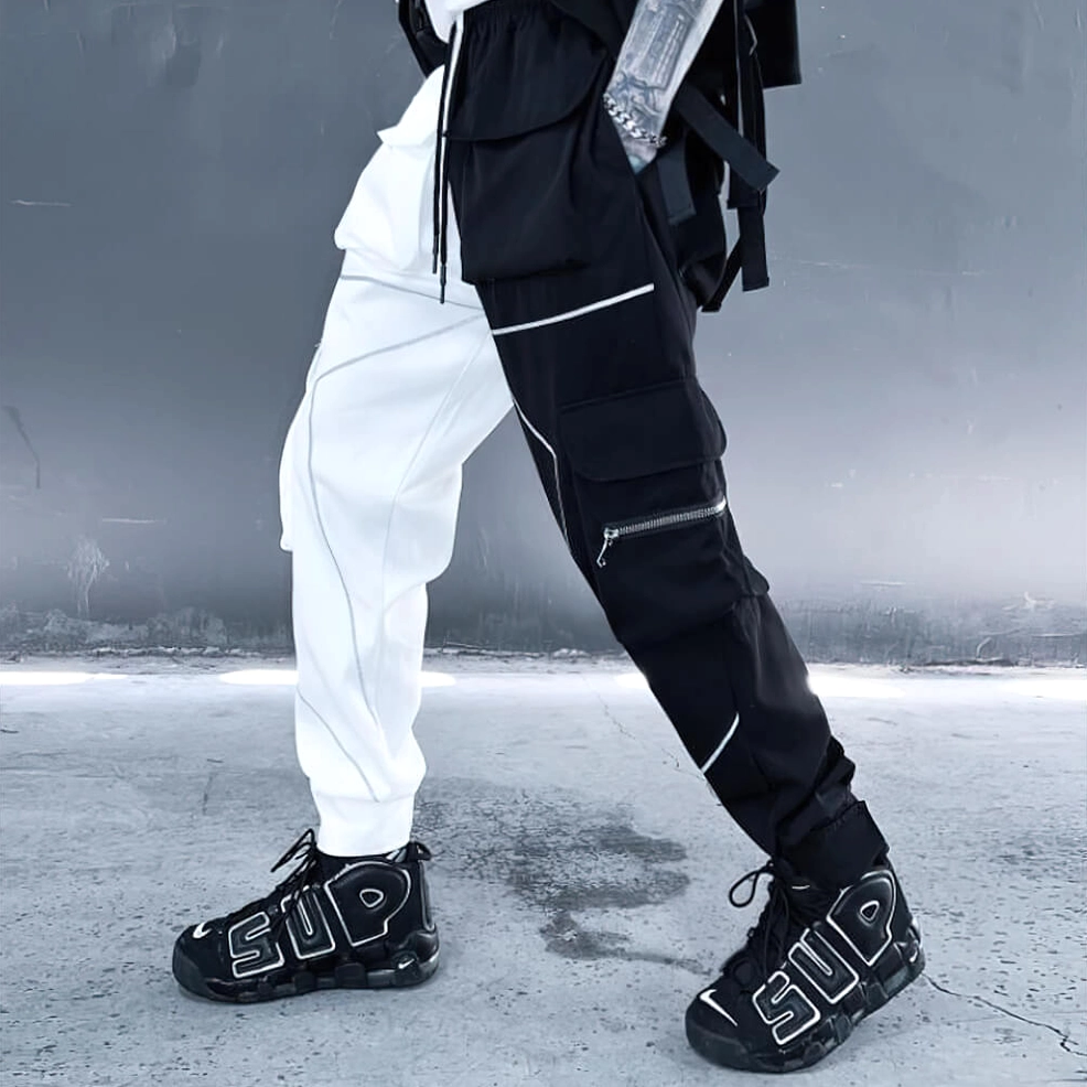 Men's gothic cargo pants with elastic waist and cuffs showing functional multi-pocket system